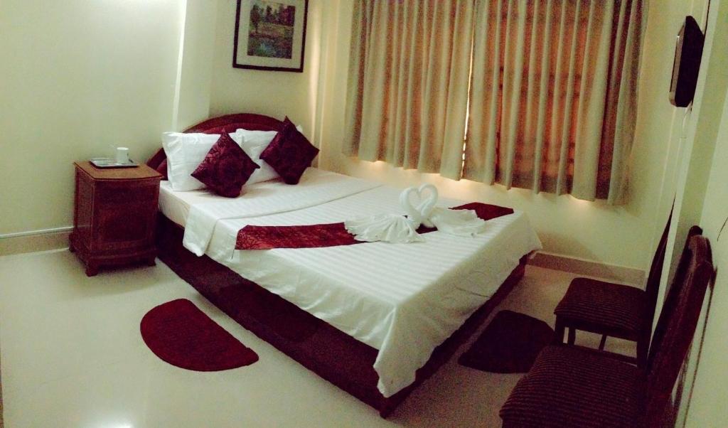 Homeland Guesthouse Phnom Penh Quarto foto