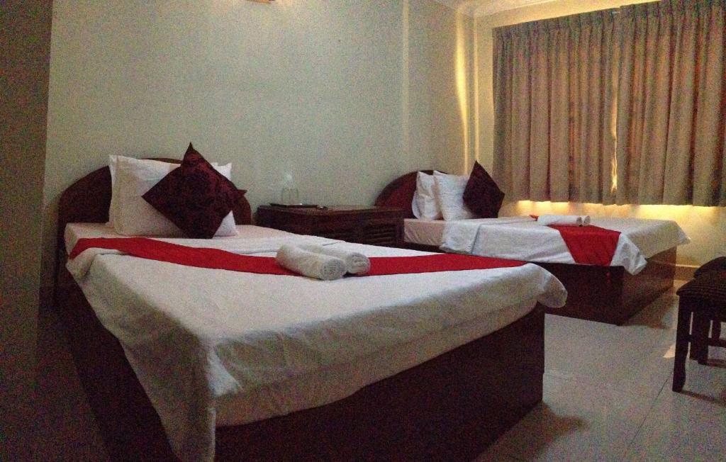 Homeland Guesthouse Phnom Penh Quarto foto