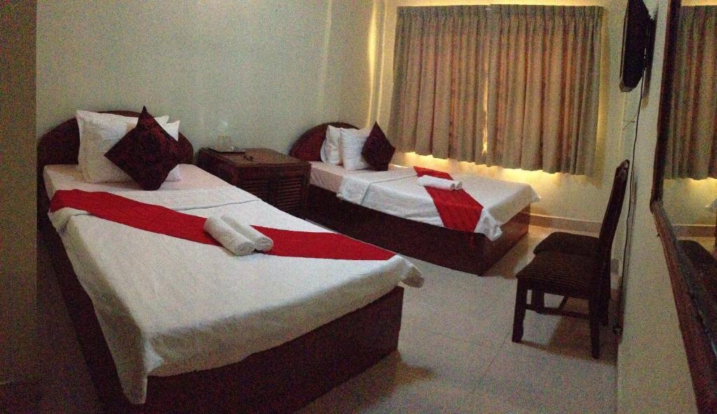 Homeland Guesthouse Phnom Penh Quarto foto